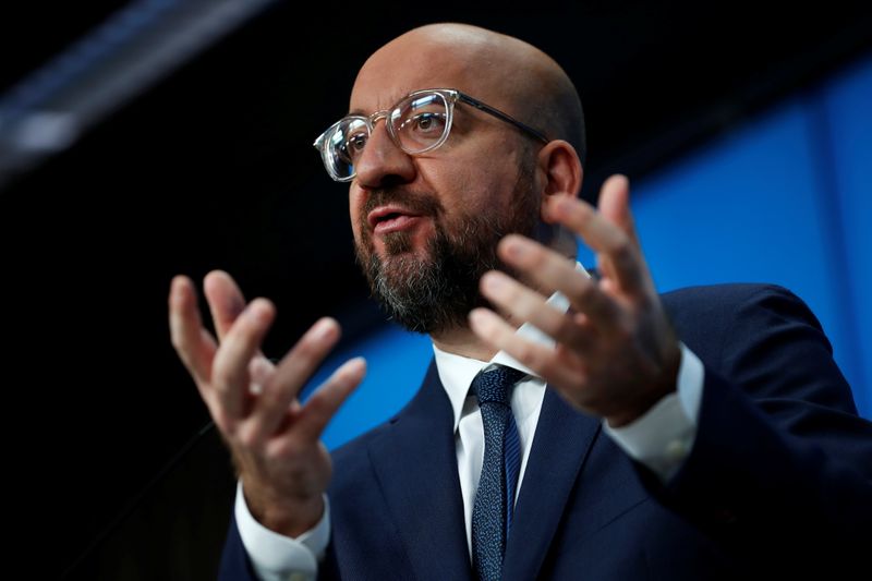 EU Council President Charles Michel talks during a news conference