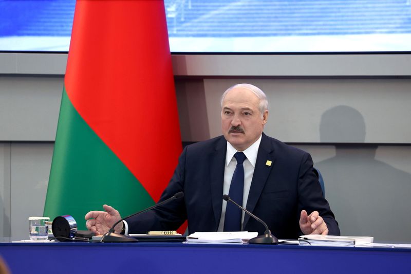 Belarusian President Alexander Lukashenko attends a meeting with members of