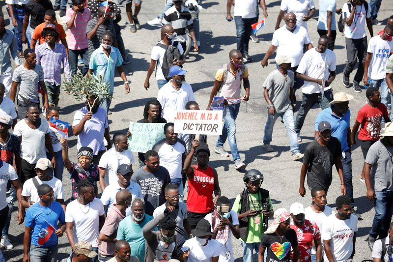 FILE PHOTO: Barricades burn in Haiti in protest against President