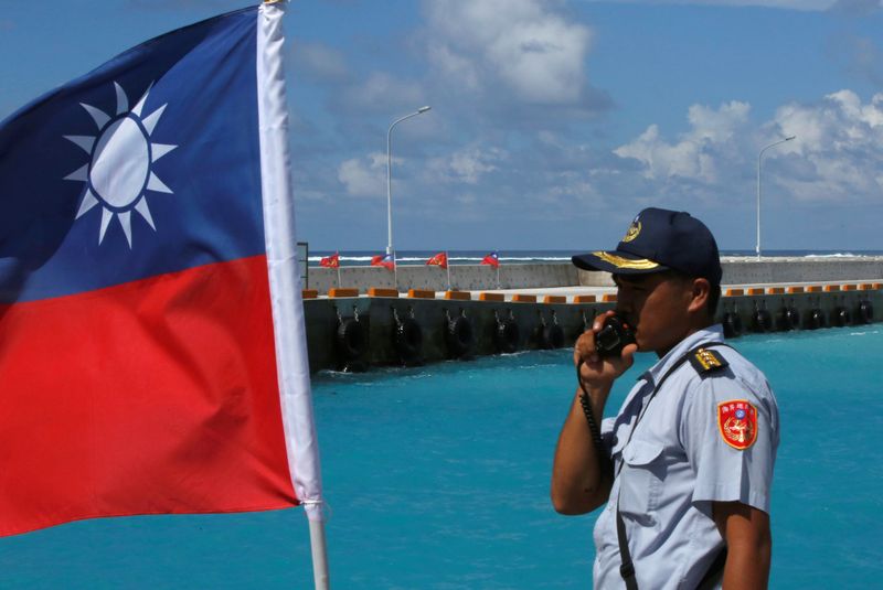 FILE PHOTO: A member of the Taiwanese Coast Guard stands