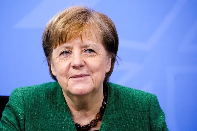 German Chancellor Angela Merkel attends a news conference following the