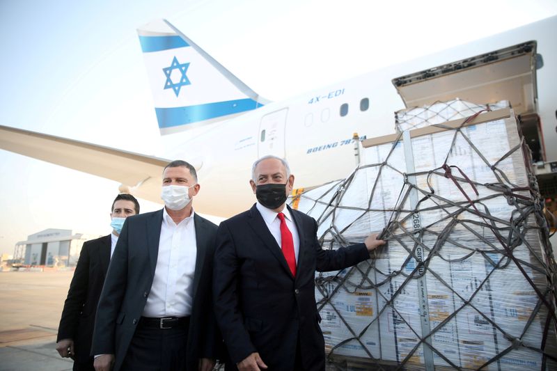 FILE PHOTO: Israel Prime Minister Benjamin Netanyahu and Health Minister