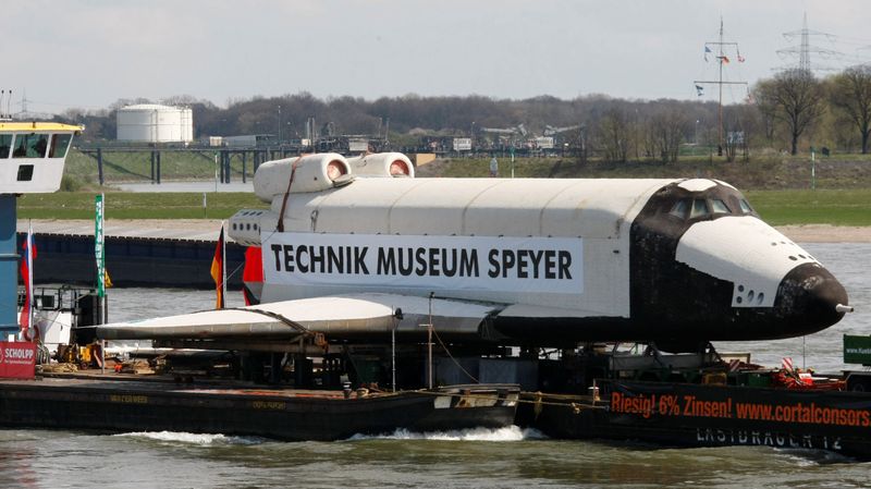 FILE PHOTO: Russian orbiter Buran is moved by barge across