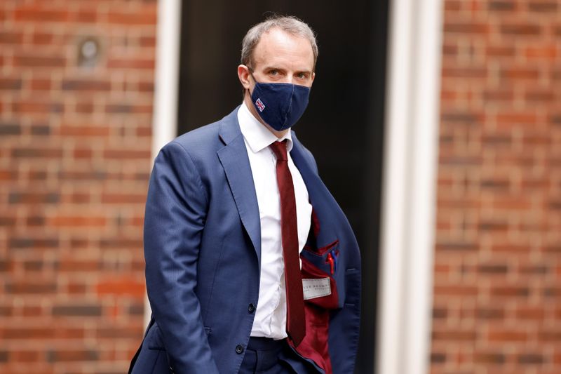 FILE PHOTO: Britain’s Foreign Affairs Secretary Dominic Raab walks outside