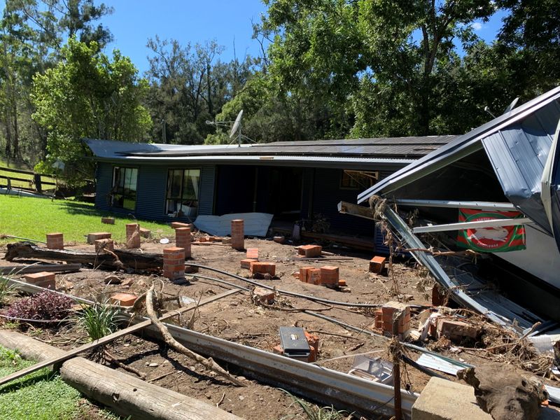 Australian cattle farmer Robert Costigan’s destroyed family home is seen