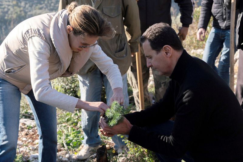 FILE PHOTO: Syria’s President Bashar al-Assad and his wife Asma,