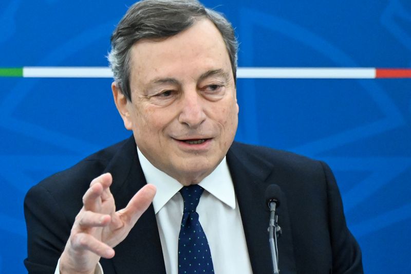 FILE PHOTO: Italy’s Prime Minister Mario Draghi speaks during a