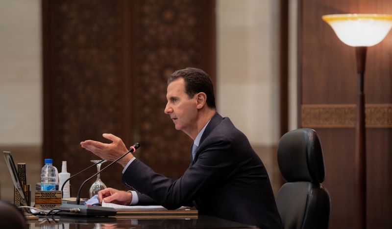 Syria’s President Bashar al-Assad meets with the Syrian cabinet in