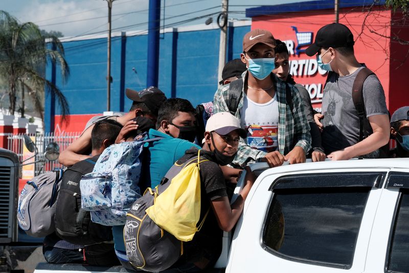 Hondurans take part in a new caravan of migrants set