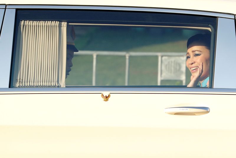 FILE PHOTO: Thailand’s Queen Suthida is pictured as the motorcade