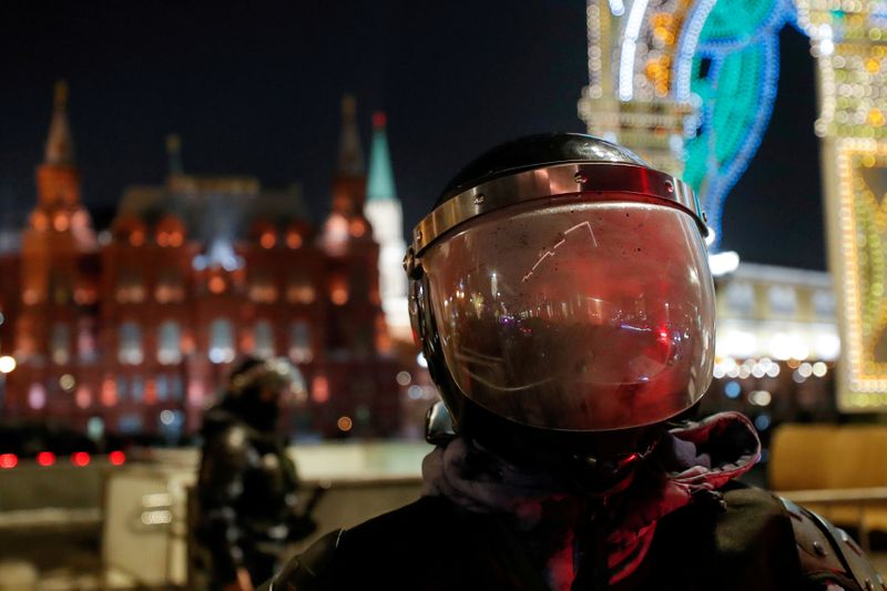 FILE PHOTO: Riot police officers stand guard in Moscow