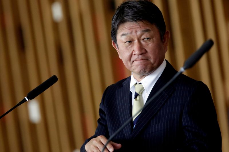 FILE PHOTO: Japan’s Foreign Minister Toshimitsu Motegi looks on during