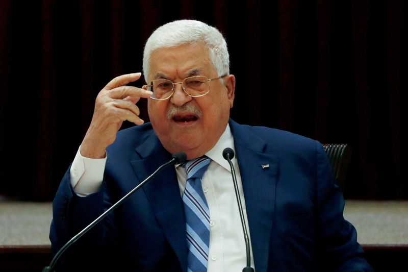 FILE PHOTO: President Mahmoud Abbas gestures during a meeting in