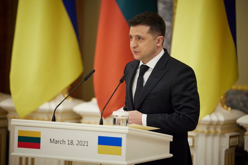 Ukrainian President Zelenskiy speaks during a news briefing in Kyiv