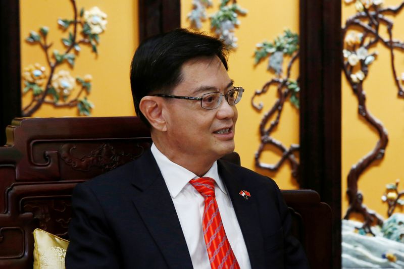 FILE PHOTO: Singapore’s Deputy Prime Minister Heng Swee Keat attends