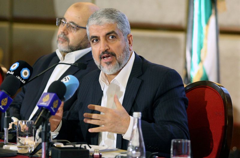 FILE PHOTO: Hamas leader Khaled Meshaal gestures as he announces