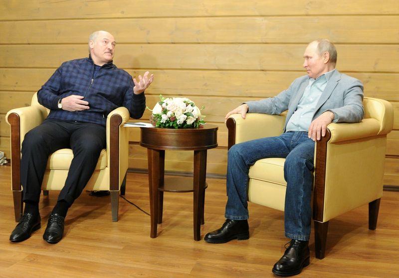 FILE PHOTO: Russian President Putin meets with his Belarusian counterpart