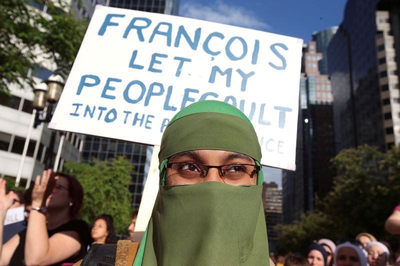 FILE PHOTO: People protest Quebec’s new Bill 21 in Montreal