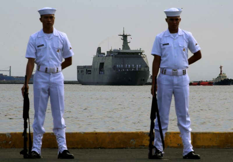FILE PHOTO: Philippine Navy personnel stand at attention as PN’s