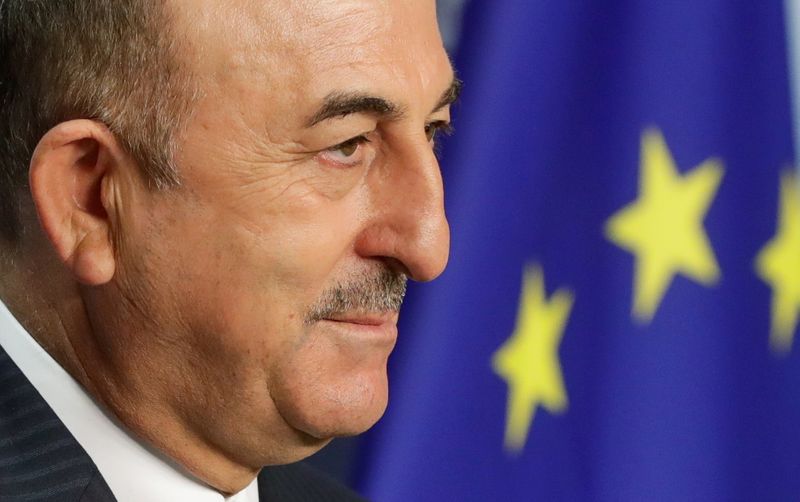 FILE PHOTO: Turkish Foreign Minister Mevlut Cavusoglu looks on during