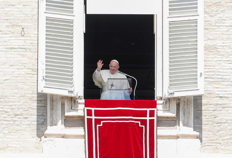 Pope Francis leads the Regina Coeli prayer from his window