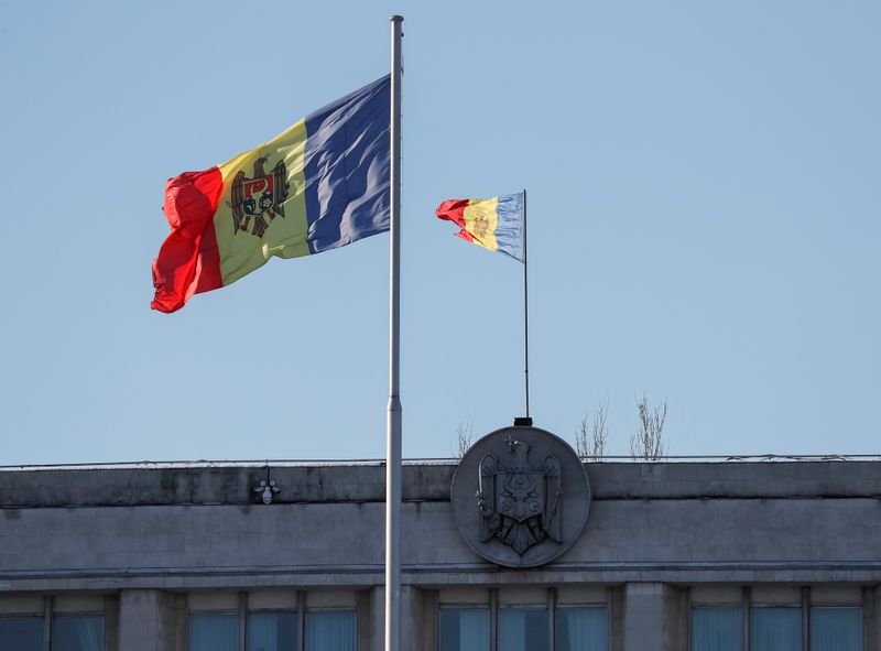 Moldova’s national flags are seen in central Chisinau