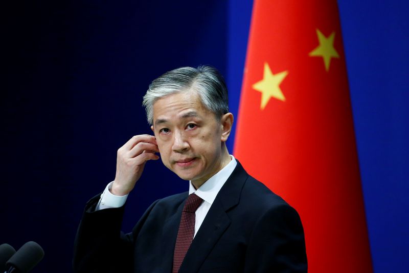 Chinese Foreign Ministry spokesman Wang Wenbin listens to a question