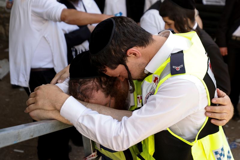 Israel observes a day of mourning after dozens were crushed