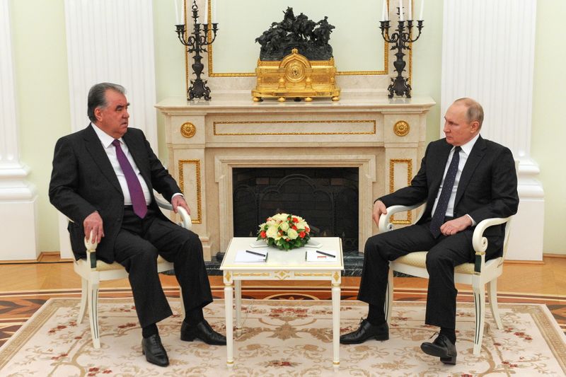 Russian President Vladimir Putin attends a meeting with his Tajik