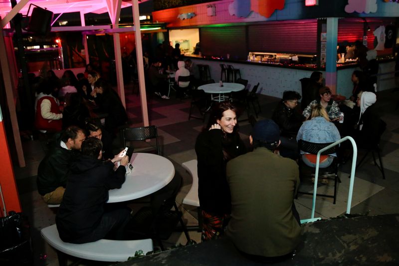 People interact at Elsewhere, a music venue and nightclub in