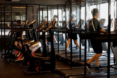 Gym members use the treadmill amid the coronavirus disease (COVID-19)