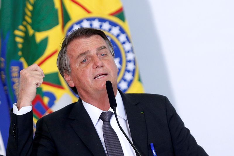 FILE PHOTO: Brazil’s President Bolsonaro signs law to allow for