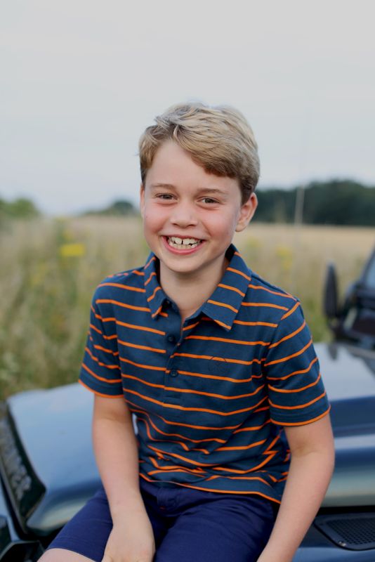 Britain’s Prince George poses ahead of his eighth birthday