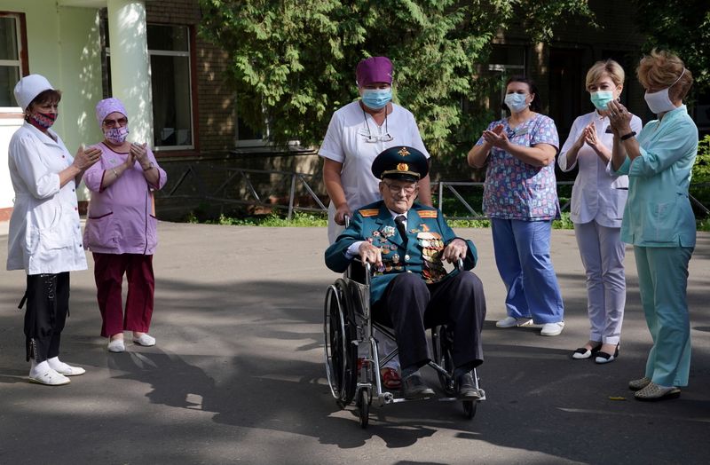World War Two veteran Nikolay Bagayev leaves a hospital after