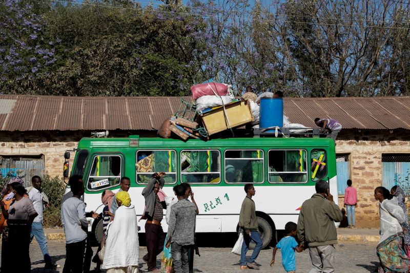 FILE PHOTO: A bus carrying displaced people arrives at the