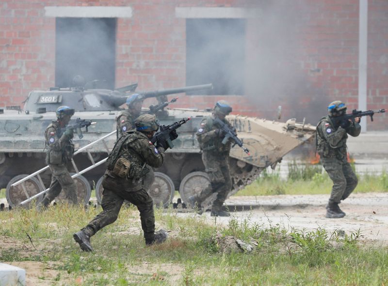 Servicemen from Ukraine, U.S., Poland and Lithuania take part in