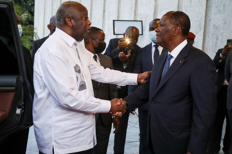 Ivory Coast’s President Alassane Ouattara meets former President Laurent Gbagbo