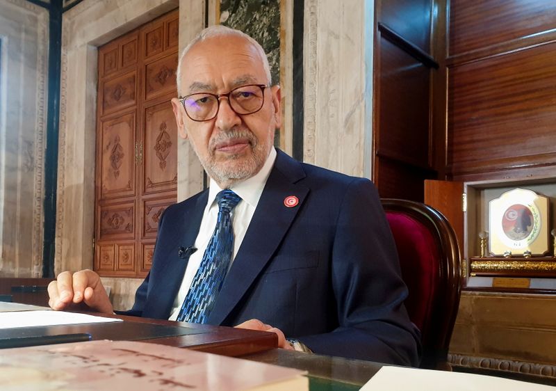 FILE PHOTO: Parliament Speaker Rached Ghannouchi poses during an interview