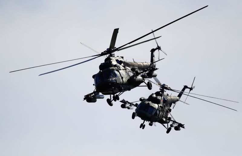 FILE PHOTO: Belarusian military helicopters fly during the Zapad 2017