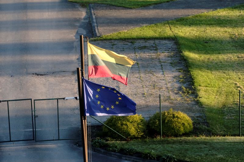 FILE PHOTO: Lithuanian and European Union flags flutter at Lithuanian