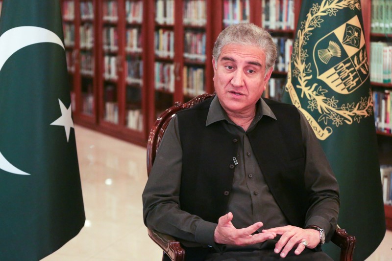 Pakistan’s Foreign Minister Shah Mehmood Qureshi gestures as he speaks