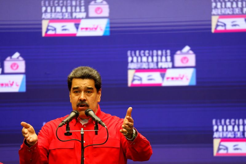 FILE PHOTO: Maduro speaks to media after voting in Socialist