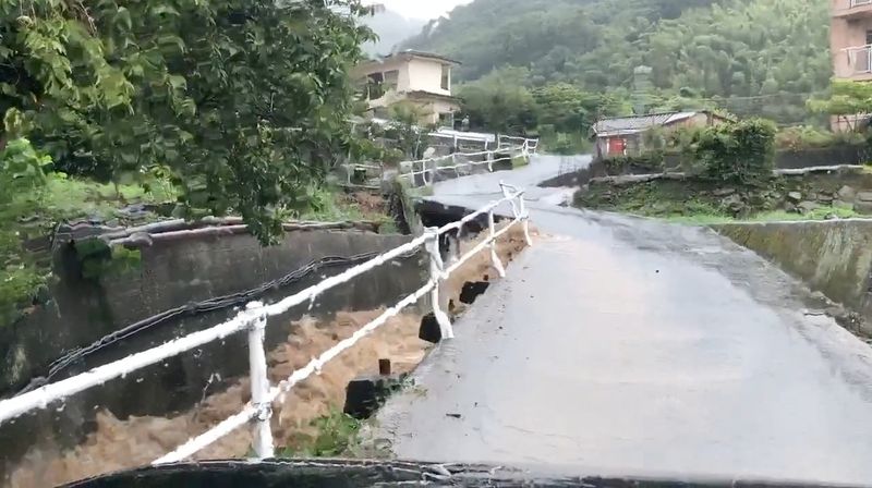 Floodwater seen in a ditch in Kure, Hiroshima Prefecture, Japan