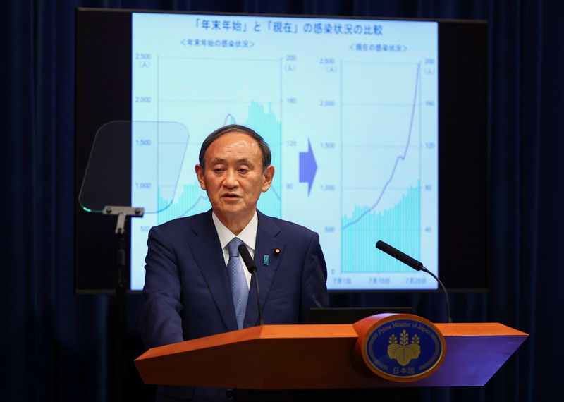 Japan’s Prime Minister Yoshihide Suga attends a news conference on