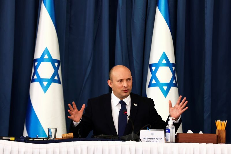 Israeli Prime Minister Naftali Bennett speaks at the weekly cabinet