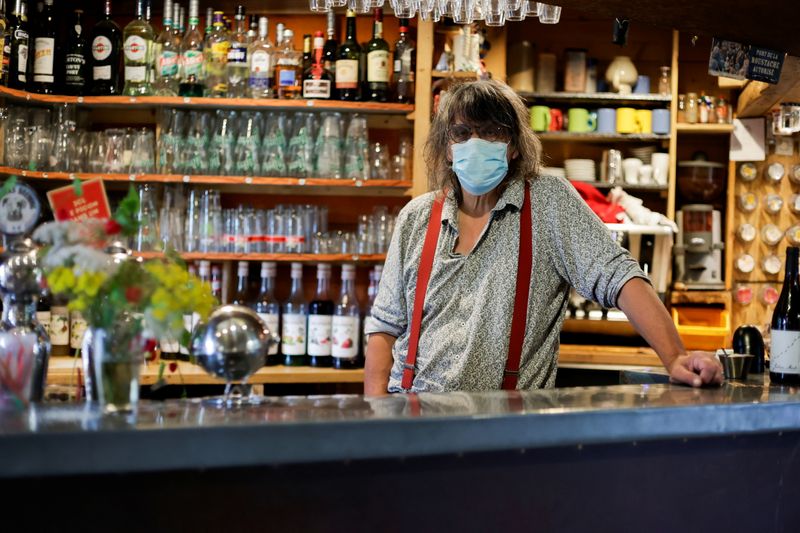 French cafe owner stands up against coronavirus disease (COVID-19) compulsory