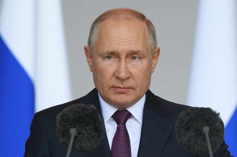 Russian President Putin attends the opening ceremony of the International