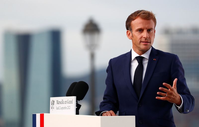 French President Macron delivers a speech at the Palais du