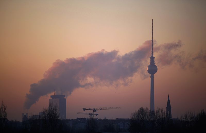 Steam and other emissions rise from a  power station