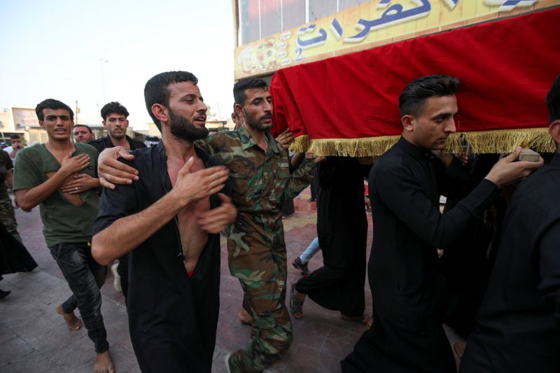 Funeral of a policeman killed in an attack in Kirkuk,